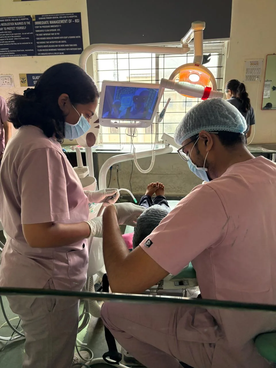 Gentle chairside treatment for a young patient at Orawell Dental Hospital Jamnagar